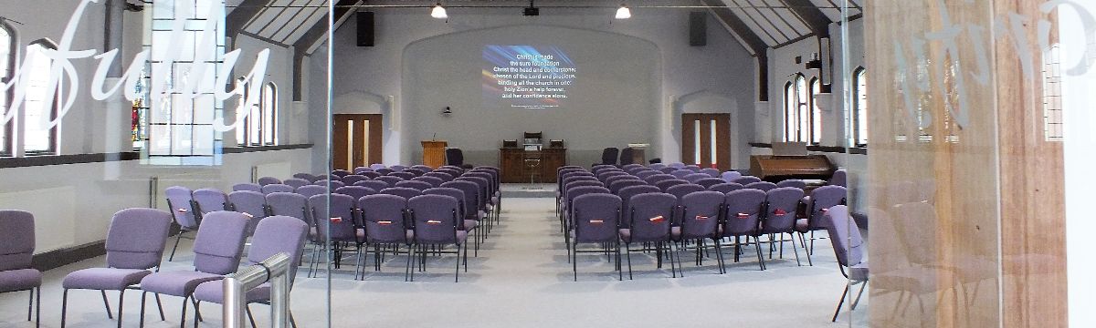 An empty church with a digital projector